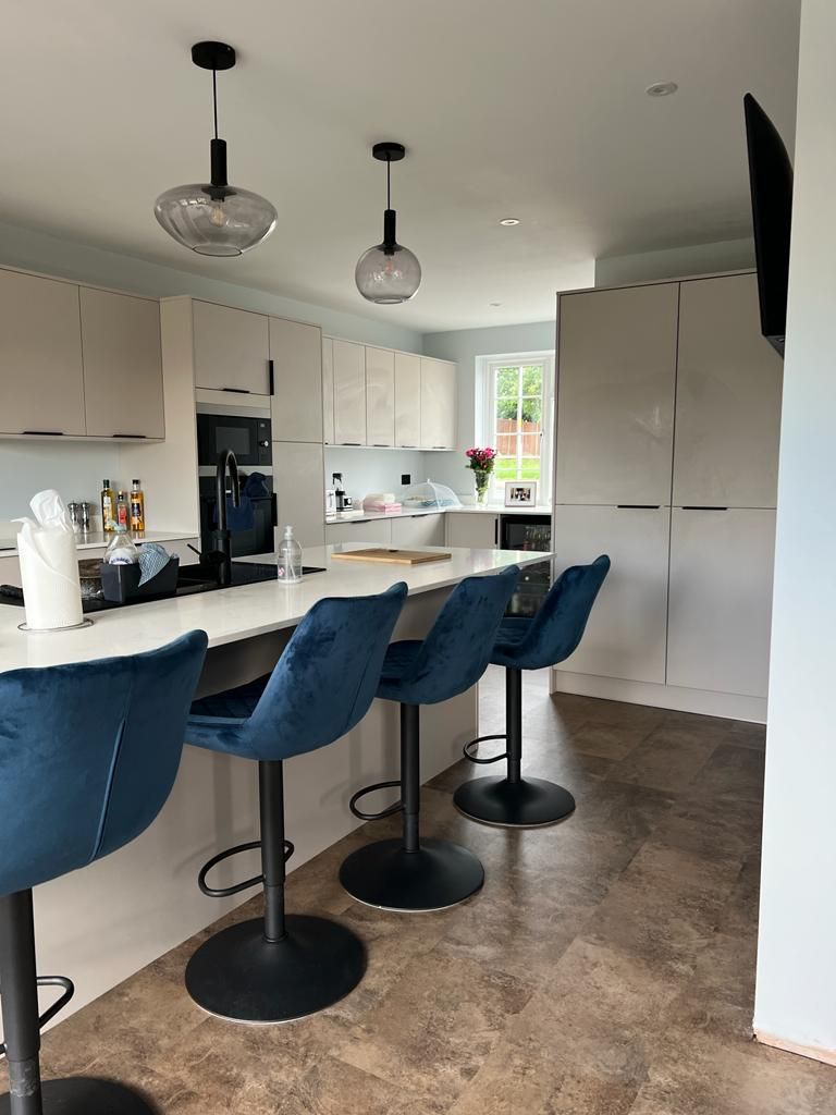 Side-return extension on a semi-detached property, reconfiguring the ground floor to create a much larger kitchen-diner.