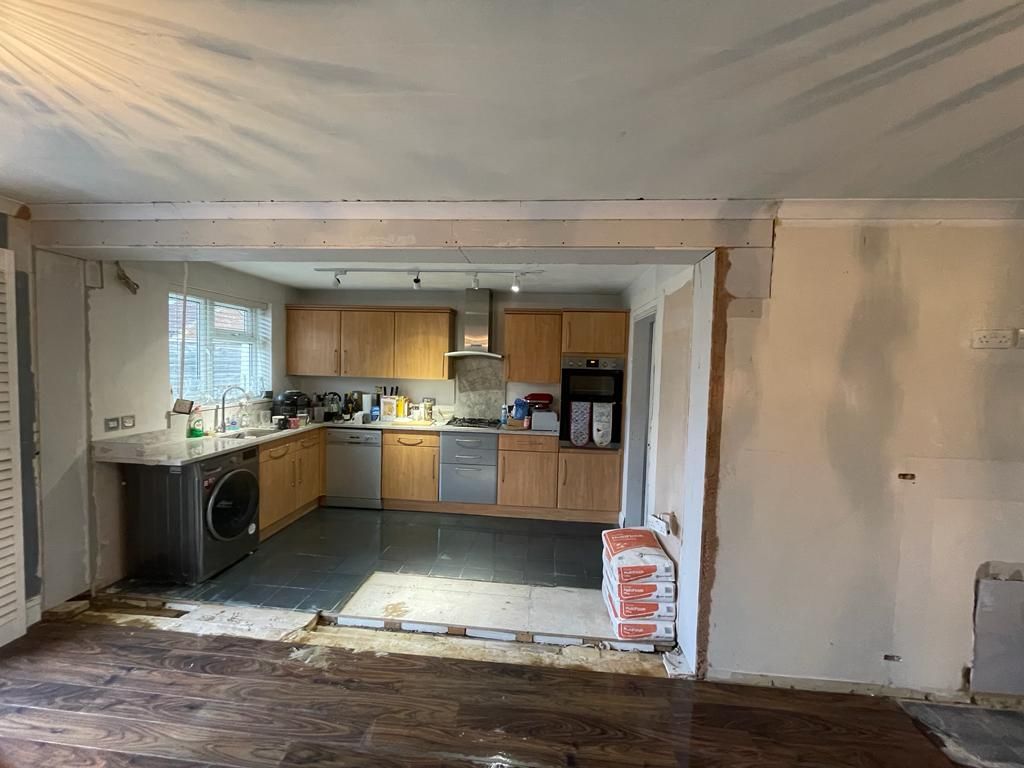 Load-bearing wall removed and RSJ installed to create an open-plan ground floor living space.
