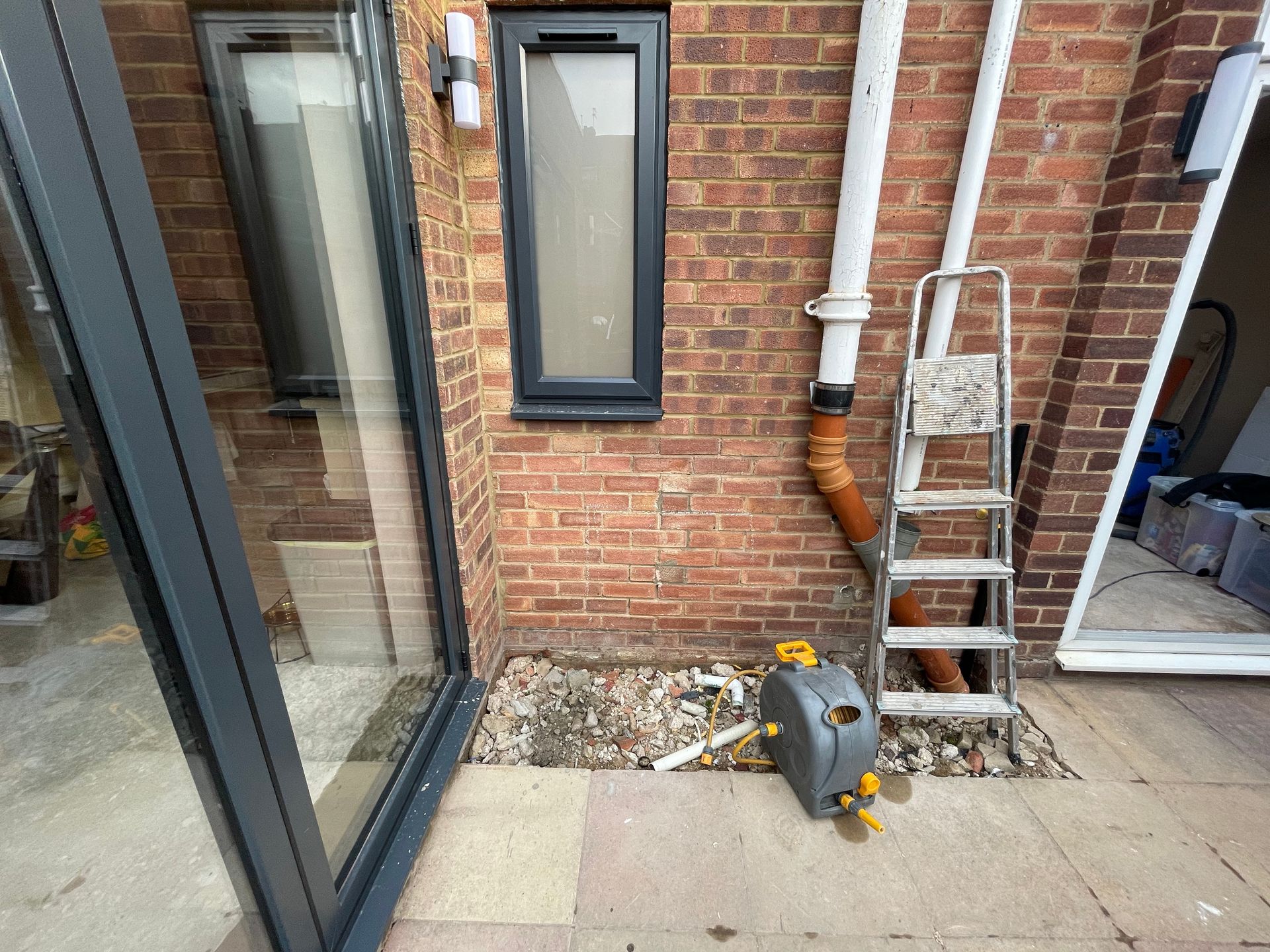 Structural renovation addressing load-bearing walls and RSJ installation for a ground floor redesign.