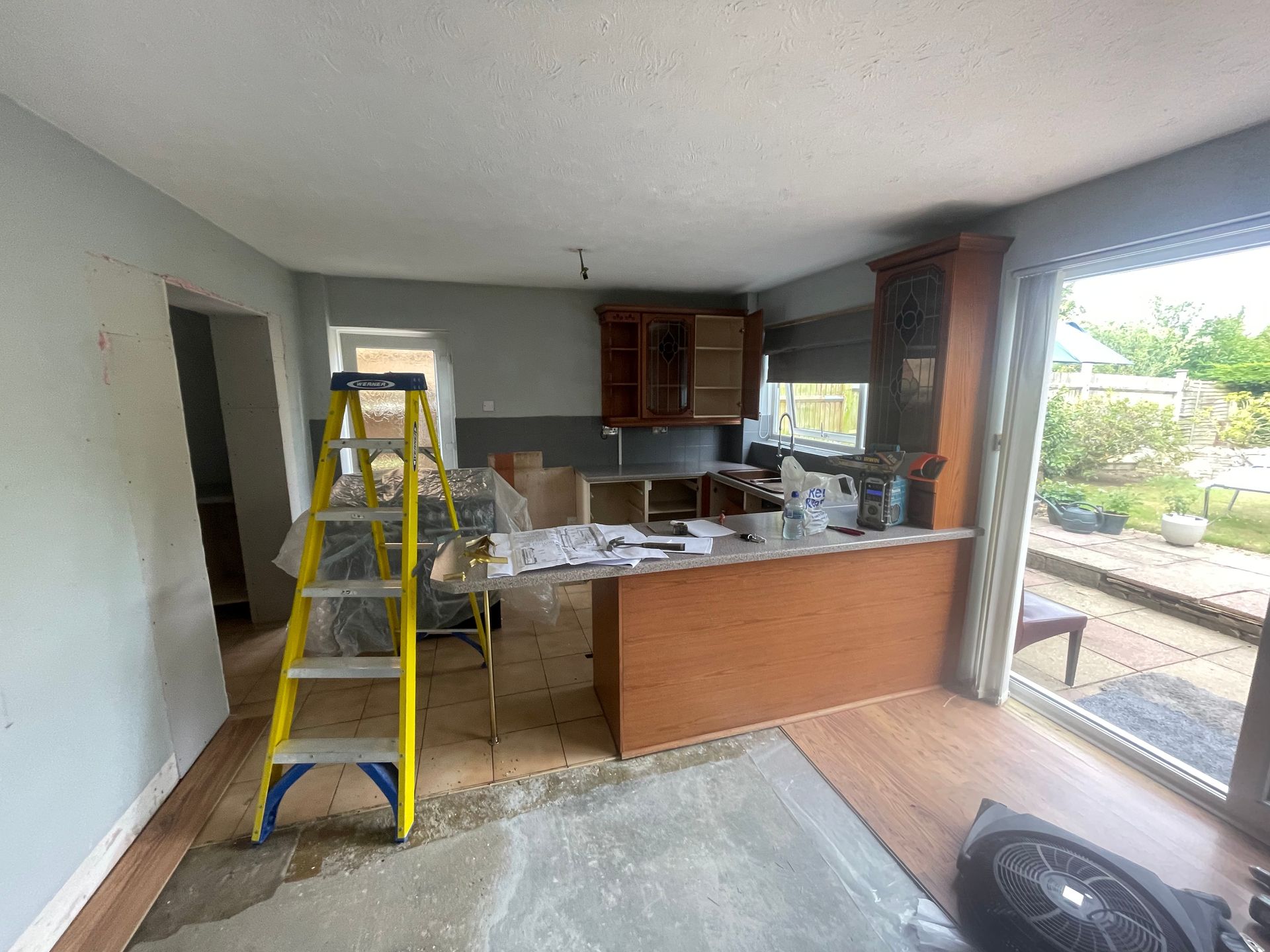 Kitchen before renovation — mid strip-out